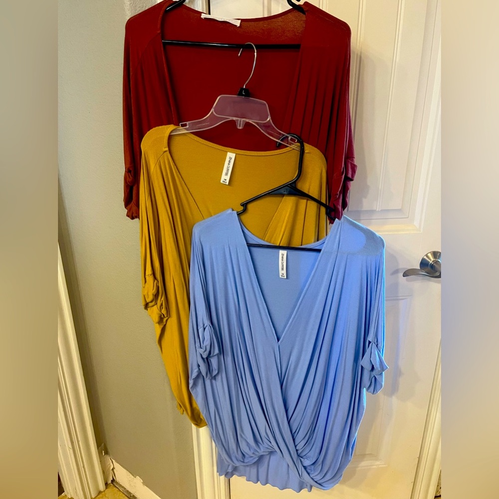 Zenana outfitters three shirts.